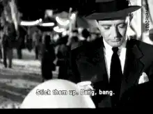 Little boy robs Gary Cooper