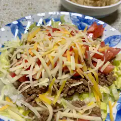 taco salad with cheese and tomatoes