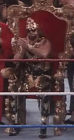 Hulk Hogan on golden throne in wrestling ring