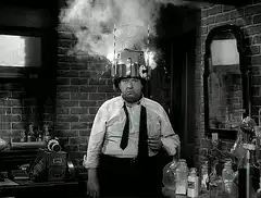 Man with smoking helmet in lab