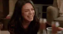 Woman laughing hysterically