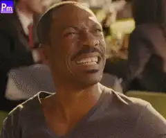Eddie Murphy laughing hysterically