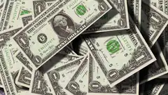 pile of one dollar bills