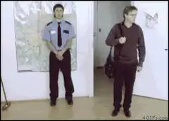 Office workers hiding in plants and desks