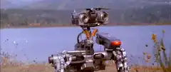 Robot with binoculars by lake