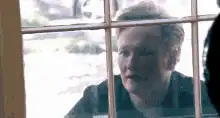 Caitlyn Jenner looking through window