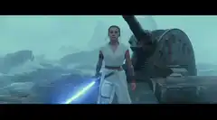Rey with lightsaber on snowy planet