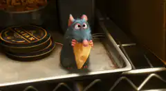 Remy eating cheese in the fridge