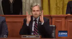 Mr. Kennedy shrugging hands up