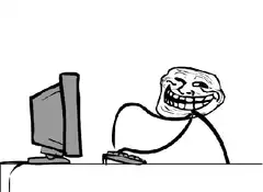 Trollface taps computer and breathes fire
