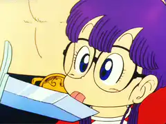 Arale eats a coin and scares a man