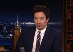 Jimmy Fallon head shake and hand wave
