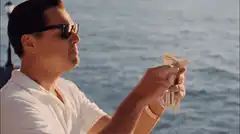 Tommy DeVito throws money off boat