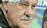 Man with mustache blinking and talking