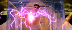 Dr. Manhattan glowing with purple energy