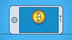Bitcoin value fluctuating on phone screen