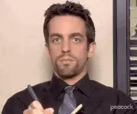 Benny from The Office looking thoughtful
