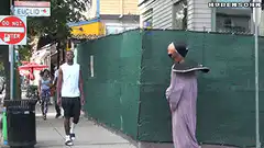 Alien walks down street and bumps into man