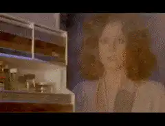 Woman opens fridge to see dragon