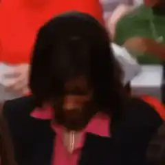 Audience members hugging and crying