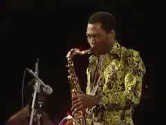 Man playing saxophone on stage