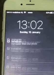 iPhone lock screen with Instagram notifications