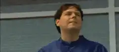 Man in blue jumpsuit parkour fails