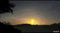 Bitcoin sun setting over mountains