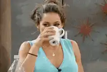 Woman drinking coffee and coughing