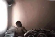 man gets hit by a pillow