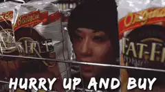 Woman in shopping cart with fat-free chips