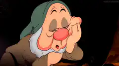 Doc from Snow White winking