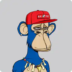 Blue monkey with red cap and bone necklace