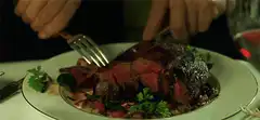 Cutting a medium rare steak