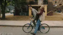 Boy and girl on a bicycle