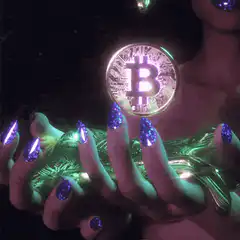 Glowing Bitcoin in hands