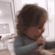 Toddler laughing hysterically