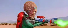 Alien with brain head shooting green laser