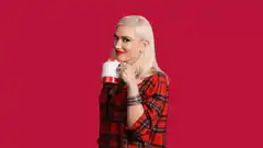Gwen Stefani drinking from a mug