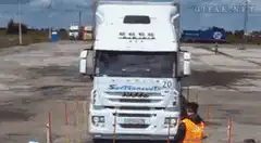 White truck parallel parking perfectly