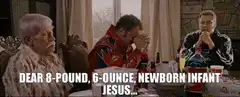 Three men praying at dinner table