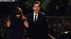 Man and woman screaming in horror