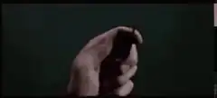 Hands assembling a remote control