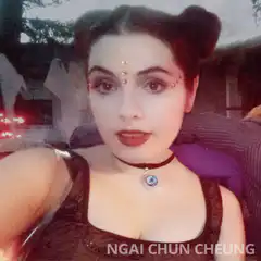 Woman with space buns and jewelry