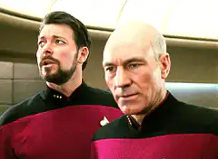 Worf hugs Captain Picard