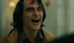 Joaquin Phoenix laughing hysterically
