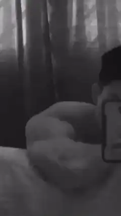 muscular man taking mirror selfies
