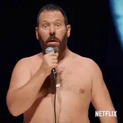 shirtless comedian wide-eyed reaction