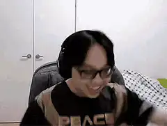 Person stretching arms behind head