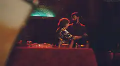 couple dancing in dimly lit restaurant